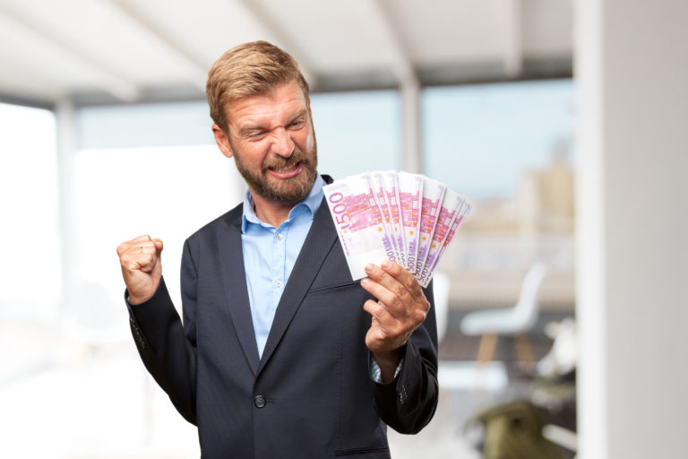 blond businessman happy expression